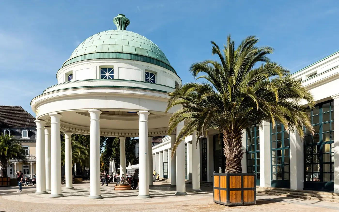 Beautiful domed architecture with palm trees in Bad Pyrmont, Germany.