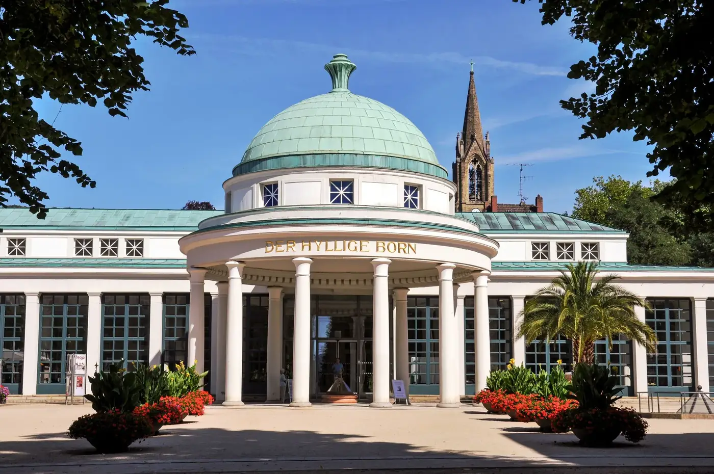 Historic spa architecture in Bad Pyrmont, Germany showcasing classical columns and a dome.