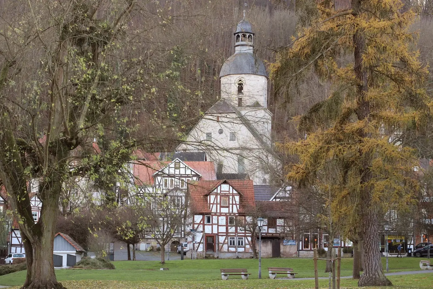 Charming half-timbered houses with a church backdrop in Bad Sooden-Allendorf, Germany.