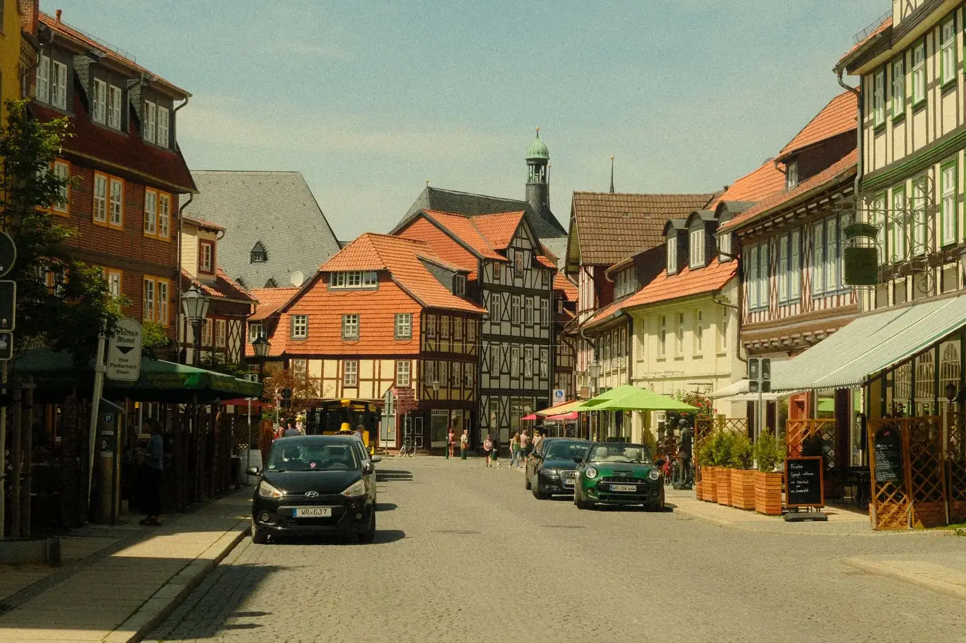 Explore the charming historic architecture of Quedlinburg's picturesque streetscape under a clear sky.
