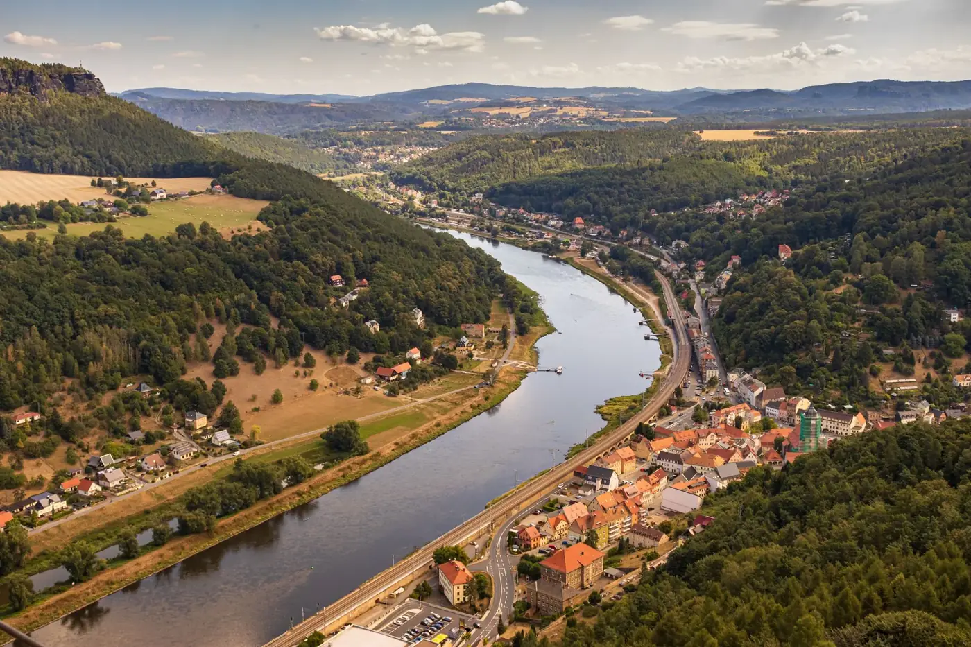 Explore the breathtaking aerial view of the Elbe River winding through the scenic landscape of Saxony.
