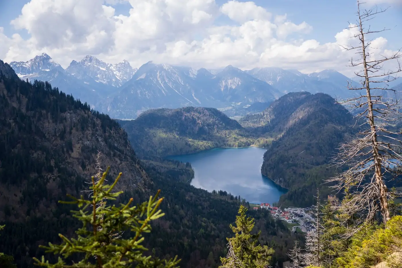 Panoramic view of Alpsee Lake and mountains from Schwangau, Bavaria, Germany.