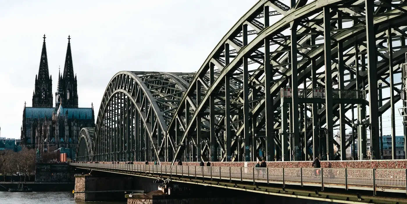 Iconic view of Hohenzollern Bridge with Cologne Cathedral in Cologne, Germany.