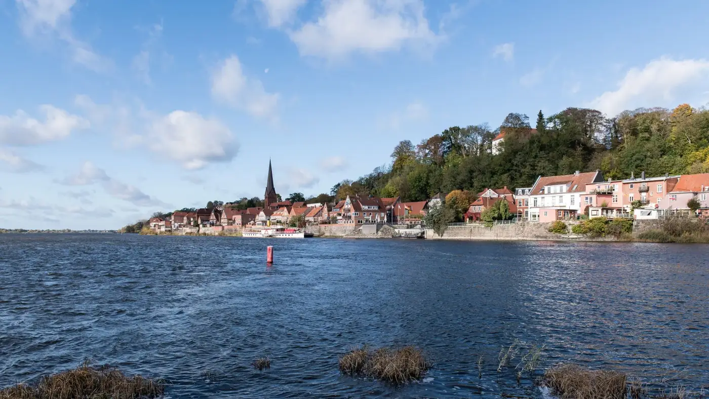 Beautiful riverfront view of Lauenburg with historic architecture and scenic Elbe river in Schleswig Holstein, Germany.