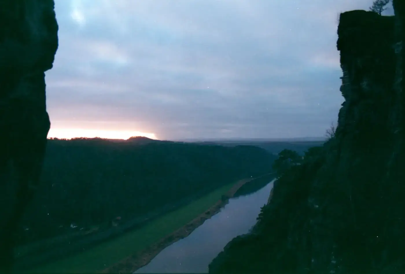 Spectacular view of the Elbe River during sunset in Saxon Switzerland, Germany.